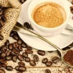 coffee beans and grounds on a table artistically