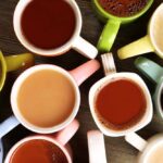Top view of different colored coffee cups